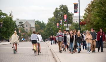 Students on a campus tour in fall.